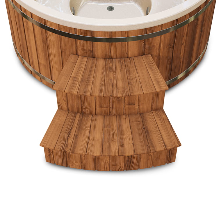 Outdoor view of wood fired hot tub with dark interior, wooden steps, towel rack, and hexagonal sauna cabin nearby