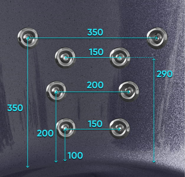 A closer view of the hydro jets in the corner of the gray hot tub insert  -   8 jets with measurements 